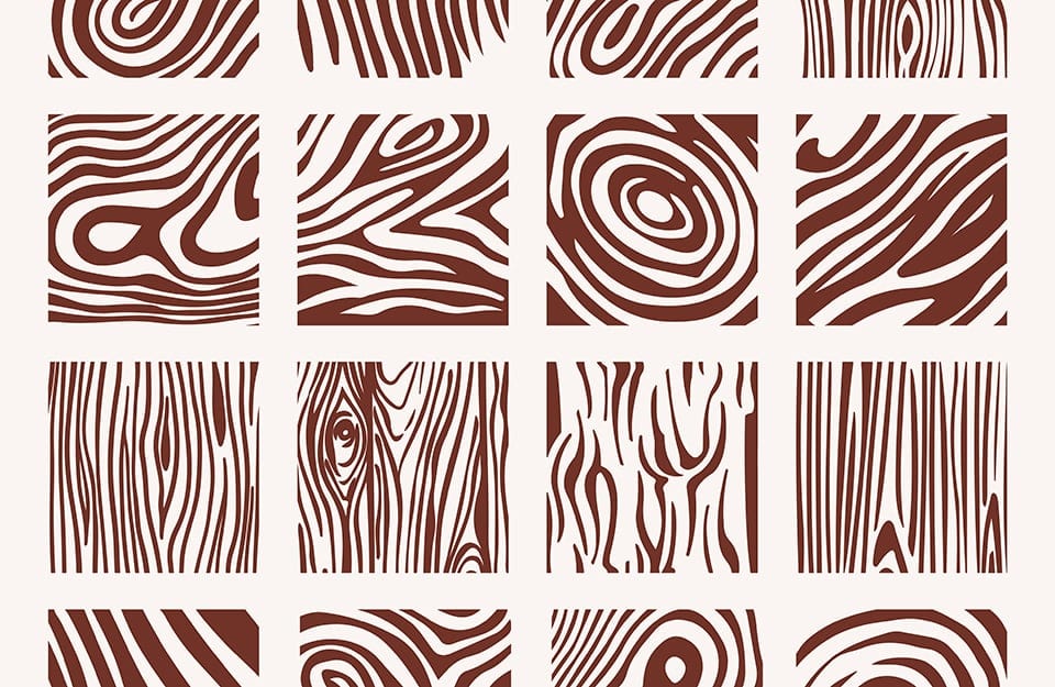 Griglia con sedici diversi schemi con disegnati in marrone su bianco alcuni tipi di venature del legno