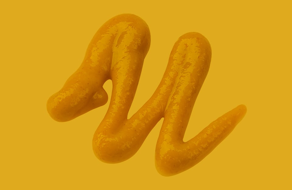 Uno schizzo di senape a forma di zig zag su sfondo giallo mostarda