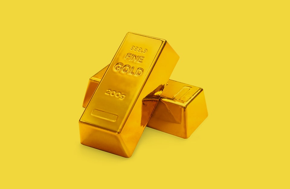 Due lingotti d'oro su sfondo giallo
