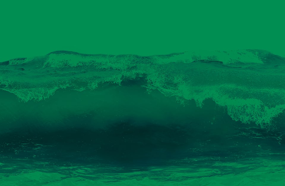 Delle alte onde oceaniche su sfondo verde